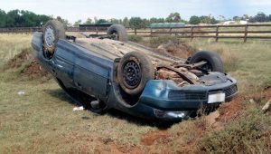 Woman survives car rollover at Rockbank blackspot