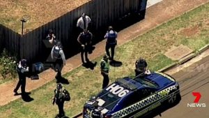Melton South siege: police negotiate with man in house