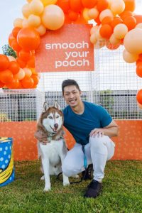 Tails wagging at dog park party