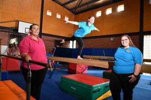 Mother and daughters trio training local gymnasts