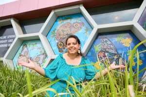 Gallery windows pay homage to migrant culture.