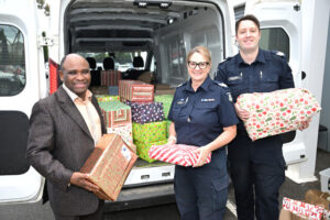 Churches, police unite for hamper drive