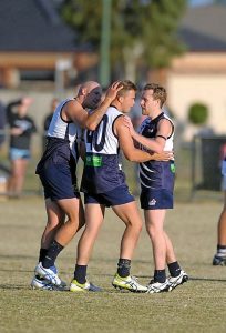 Cats hold on for the win